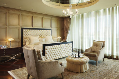 Inspiration for a large contemporary master dark wood floor bedroom remodel in Miami with beige walls