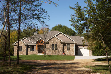 Rustic exterior home idea in Cedar Rapids