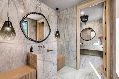 Powder room - contemporary multicolored tile and stone slab powder room idea in Los Angeles with quartzite countertops, multicolored countertops and a built-in vanity