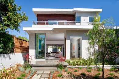 Trendy wood exterior home photo in Los Angeles