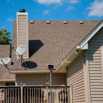 Seamless Polymer Siding in Mountain Clay w/ Energy Efficient Replacement Windows