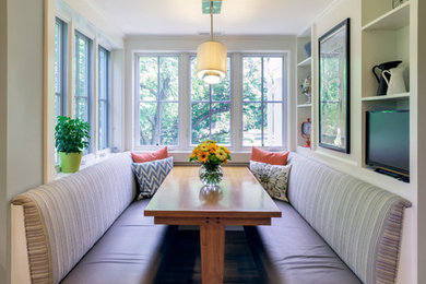 Kitchen/dining room combo - mid-sized transitional medium tone wood floor and brown floor kitchen/dining room combo idea in Baltimore with green walls and no fireplace