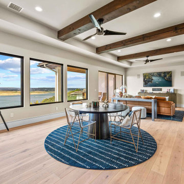 Game Room with Lake Views and Wood Beam Ceiling