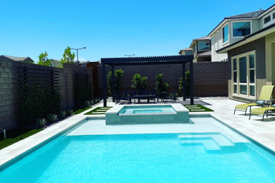 Inspiration for a mid-sized modern pool remodel in Las Vegas