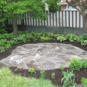 Crystal Beach - Flagstone Walkway, Patio & Transplanting Project