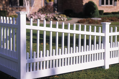 This is an example of a mid-sized traditional partial sun backyard formal garden in Boston.