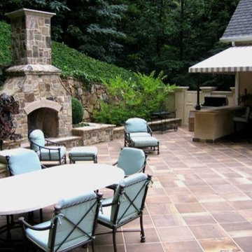 Grand Fieldstone Fireplace, Pool terrace, retractable awning, Grill and Bar