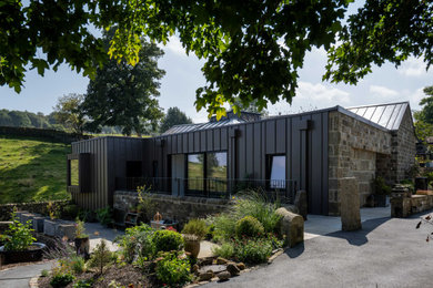 Design ideas for a contemporary house exterior in Other.