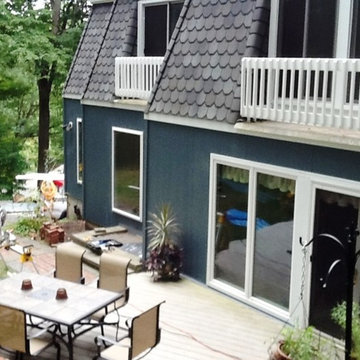Mansard roof with copper trim and new siding