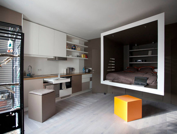 Современный Семейная комната by Cyril Rheims Architecte