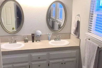 Example of a transitional bathroom design in Other