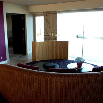 Modern furniture that hides TV with lift kit in family room with a view