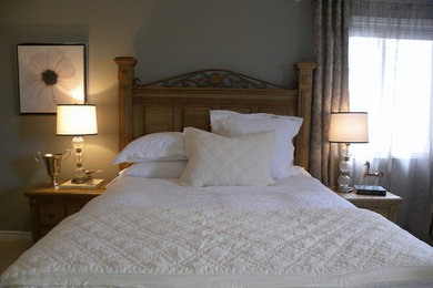 Bedroom - small transitional guest carpeted bedroom idea in Toronto with gray walls and no fireplace