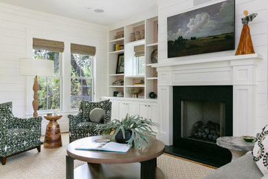 Example of a beach style living room design in Charleston