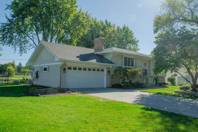 Garage workshop - mid-sized traditional attached two-car garage workshop idea in Minneapolis