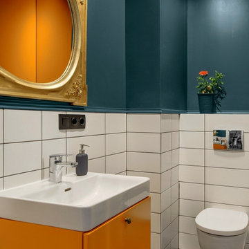 Orange/Blue with white tiles bath