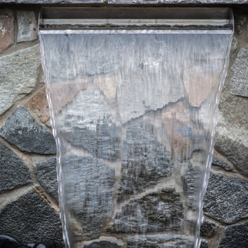 Luxury Backyard Retreat with Armour Stone & Water Feature | Genesis on the Lakes