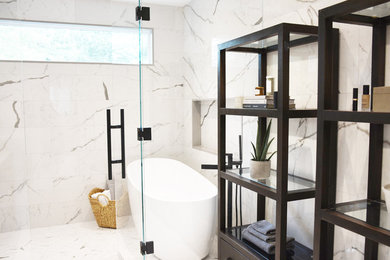 Example of a large urban master gray tile and porcelain tile porcelain tile and gray floor bathroom design in Other with an undermount sink, quartz countertops, a hinged shower door and gray countertops