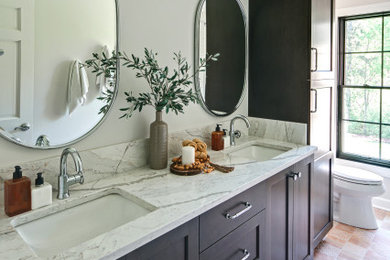 Bathroom - mid-sized transitional kids' white tile and ceramic tile terra-cotta tile, pink floor and double-sink bathroom idea in Chicago with flat-panel cabinets, brown cabinets, a one-piece toilet, gray walls, an undermount sink, quartz countertops, beige countertops, a niche and a built-in vanity