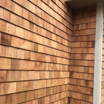 Rebuild Custom Porch and add cedar shake siding around home