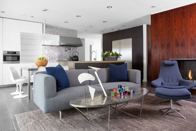 Living room - mid-sized modern open concept and formal gray floor and laminate floor living room idea in Other with a standard fireplace, a wood fireplace surround, no tv and white walls