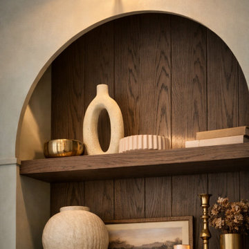Custom Arched Built-In Cabinets with Gallery Lighting | Jacksonville Living Room