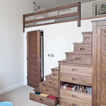 Walnut stairs with storage solutions