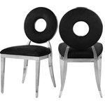 Meridian Furniture - Carousel Upholstered Dining Chair, Set of 2, Black Velvet, Chrome Finish - Yield to the decorator within when you bring home this Carousel velvet dining chair. This chair features a metal frame and legs finished in chrome stainless steel for a modern touch, but the real star of the show is the donut-shaped seat back that exudes undeniable contemporary charm. The seat and back are both plumply filled for comfort and upholstered in black velvet for a chic look.