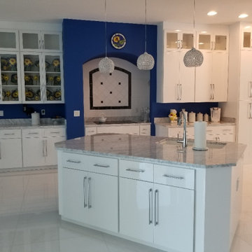 Modern Kitchen Remodel Done in a White Acrylic Glossy Flat Door