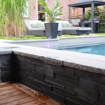 Modern Landscape with Fiberglass Pool, slab patio, water feature and more!