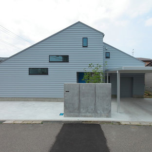 他の地域のコンテンポラリースタイルのおしゃれな白い家 (片流れ屋根) の写真