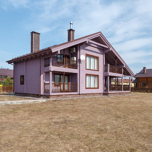 Inspiration för stora lila hus, med två våningar, sadeltak och tak i metall