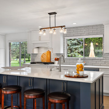 Starmark Bridgeport Kitchen & Primary Bath in White & Blueberry