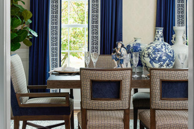 Inspiration for a large timeless wallpaper dining room remodel in New York