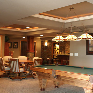 Eye-popping Denver Basement Remodel with hidden bookcase doors and tray ceilings