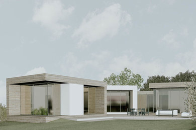 Design ideas for a small contemporary bungalow detached house in Devon with wood cladding, a flat roof and a green roof.