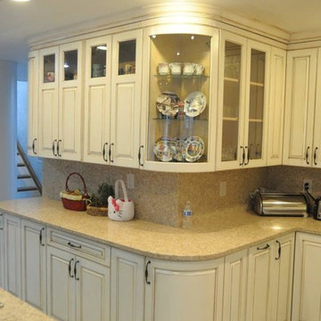 Traditional Antique Ivory/Walnut Two Tone Solid-wood kitchen.