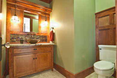 Inspiration for a craftsman bathroom remodel in Orange County with a vessel sink
