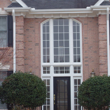 Entrance door, sidelites, and paladian windows