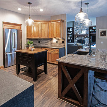 Reconfigured kitchen with new islands, countertops, backsplash