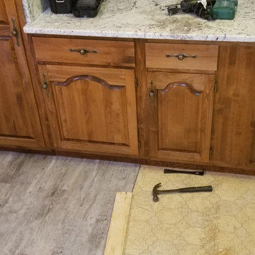 New vinyl plank flooring in a summer home kitchen