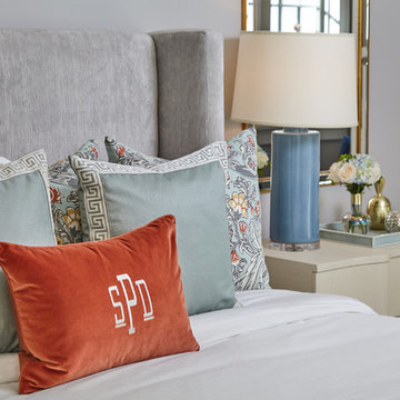 Serene Master Bedroom with Pops of Blue and Orange