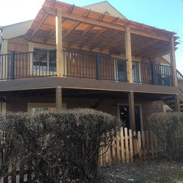 Large upper level composite deck and pergolas