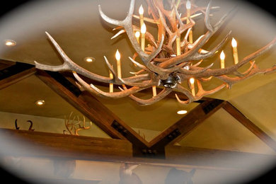 Mountain style home design photo in Other