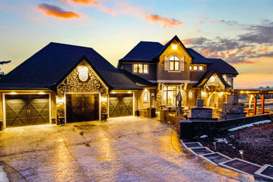 Home design - large french country home design idea in Calgary