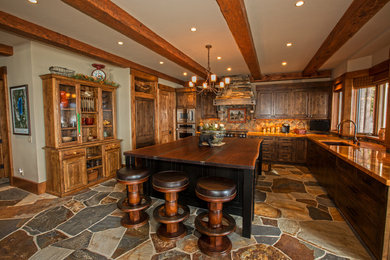 Kitchen - rustic kitchen idea in Other