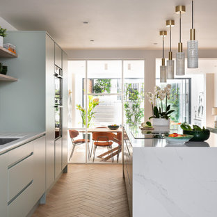 75 Beautiful Kitchen with Green Cabinets and Quartz Backsplash Pictures