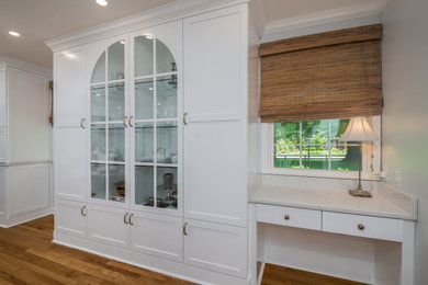 Example of a kitchen design in Other with white cabinets