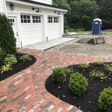 LYNNFIELD BRICK WALKWAY PATH WITH MONOLITHIC GRANITE STEPS TO PORCH