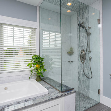 Contemporary Primary Spa Bath With Kohler Archer BubbleMassage Air Bath Tub